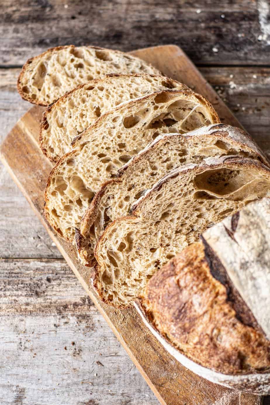 sliced sourdough on a wooden board