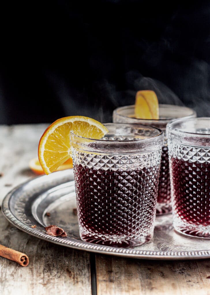 steaming mulled wine with orange slices