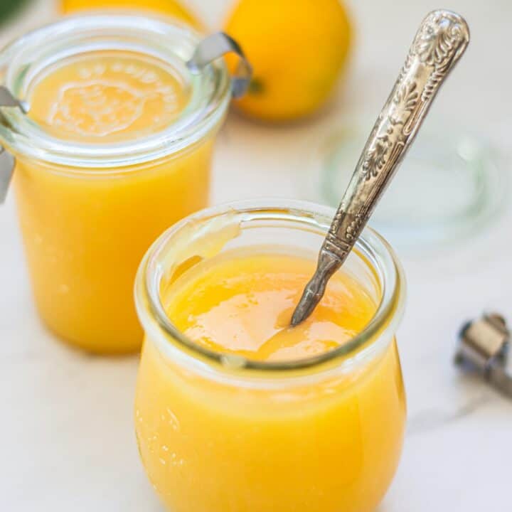 two jars of yellow lemon curd