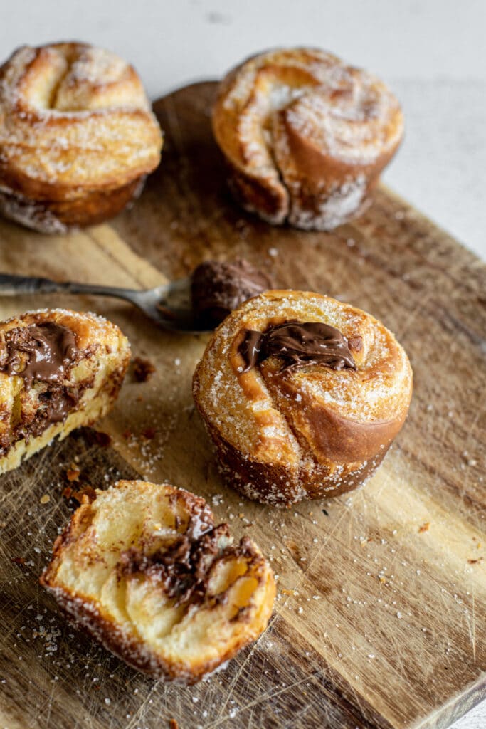 nutella cruffins on a wooden board