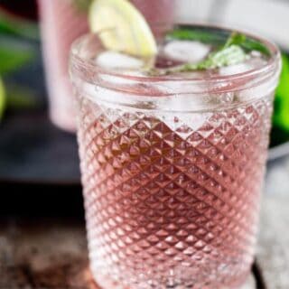 a glass of pink rhubarb gin.