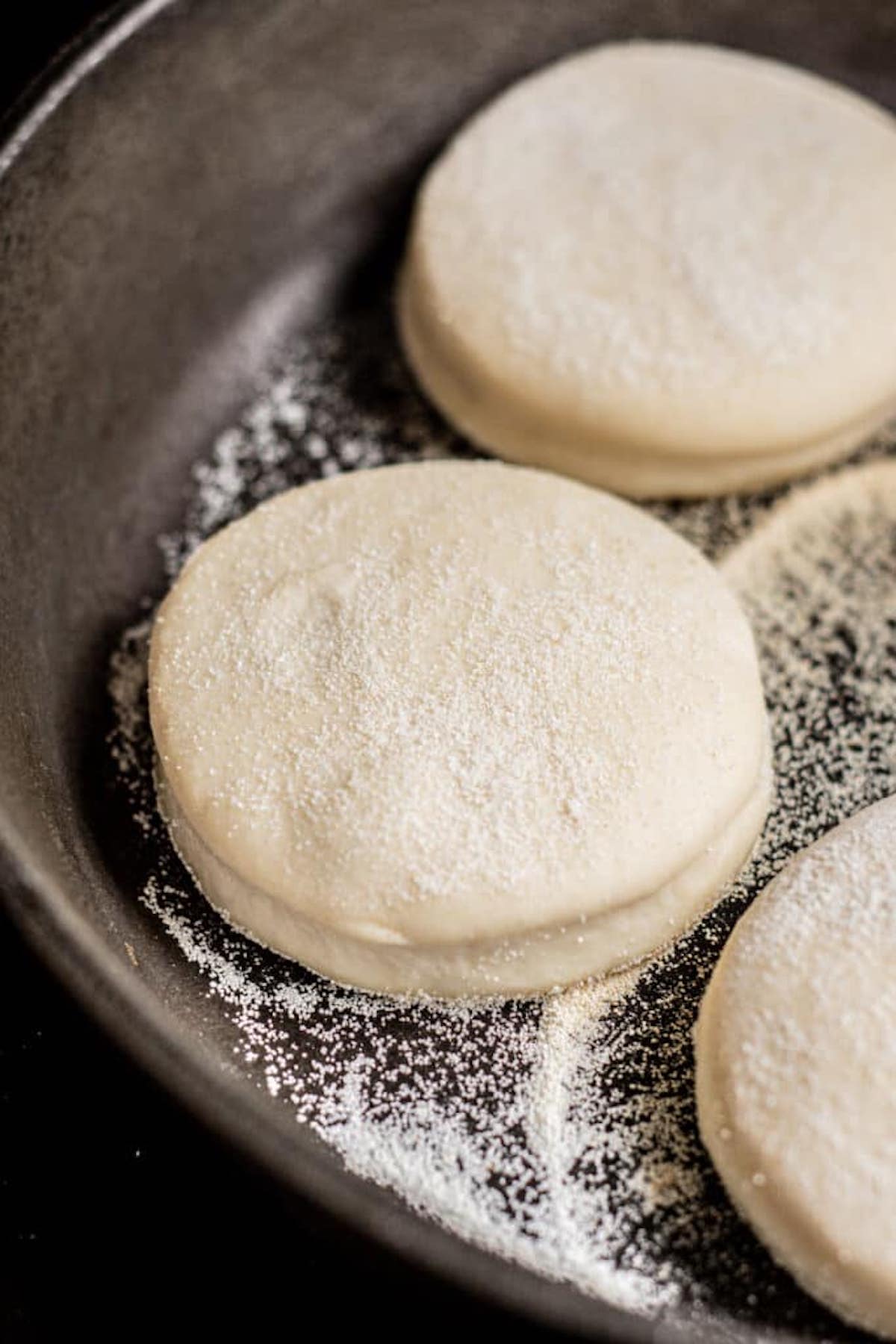 uncooked English muffins.
