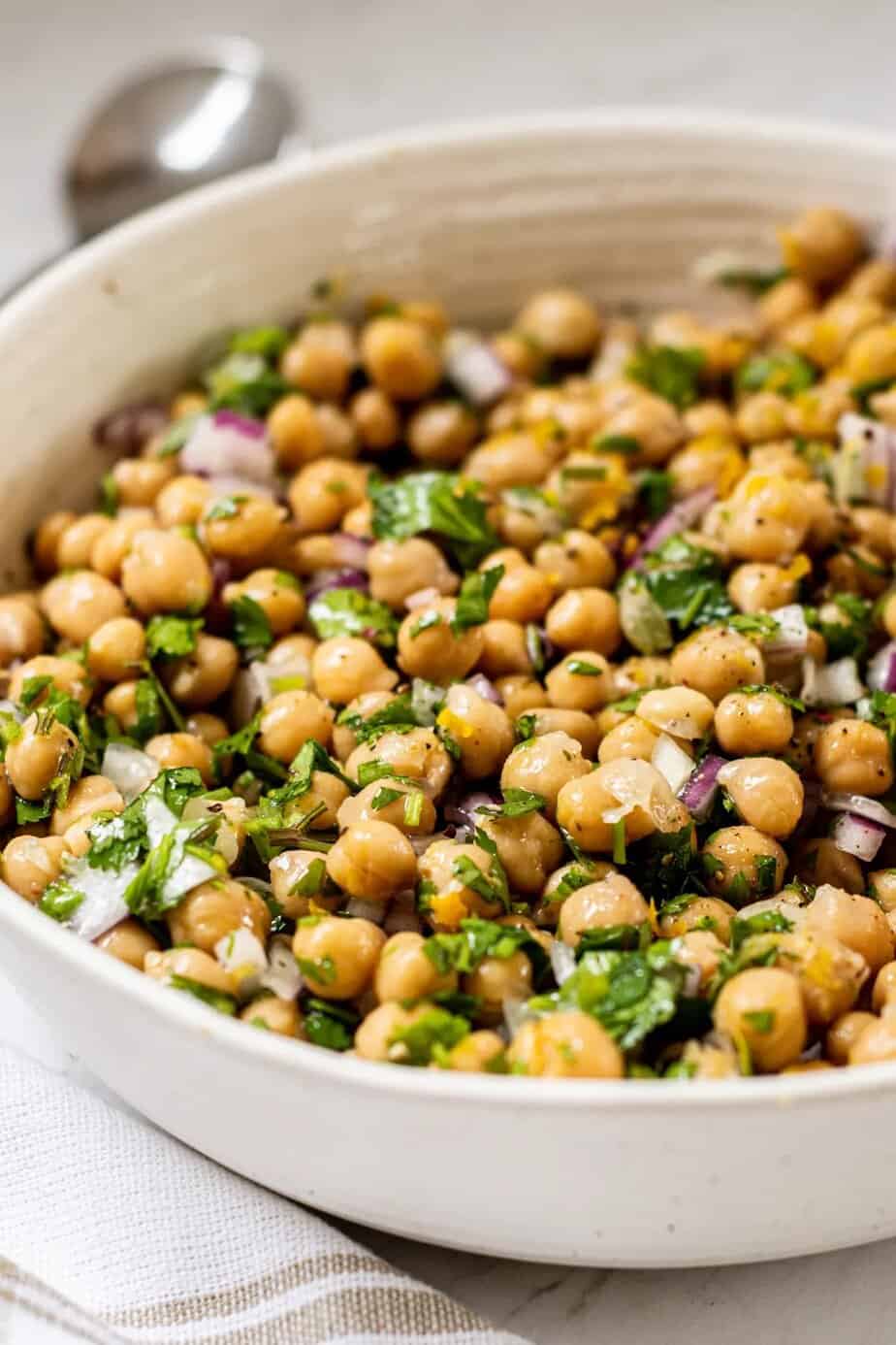 bowl of chickpeas and herbs.