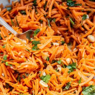 close up of raw shredded carrots.