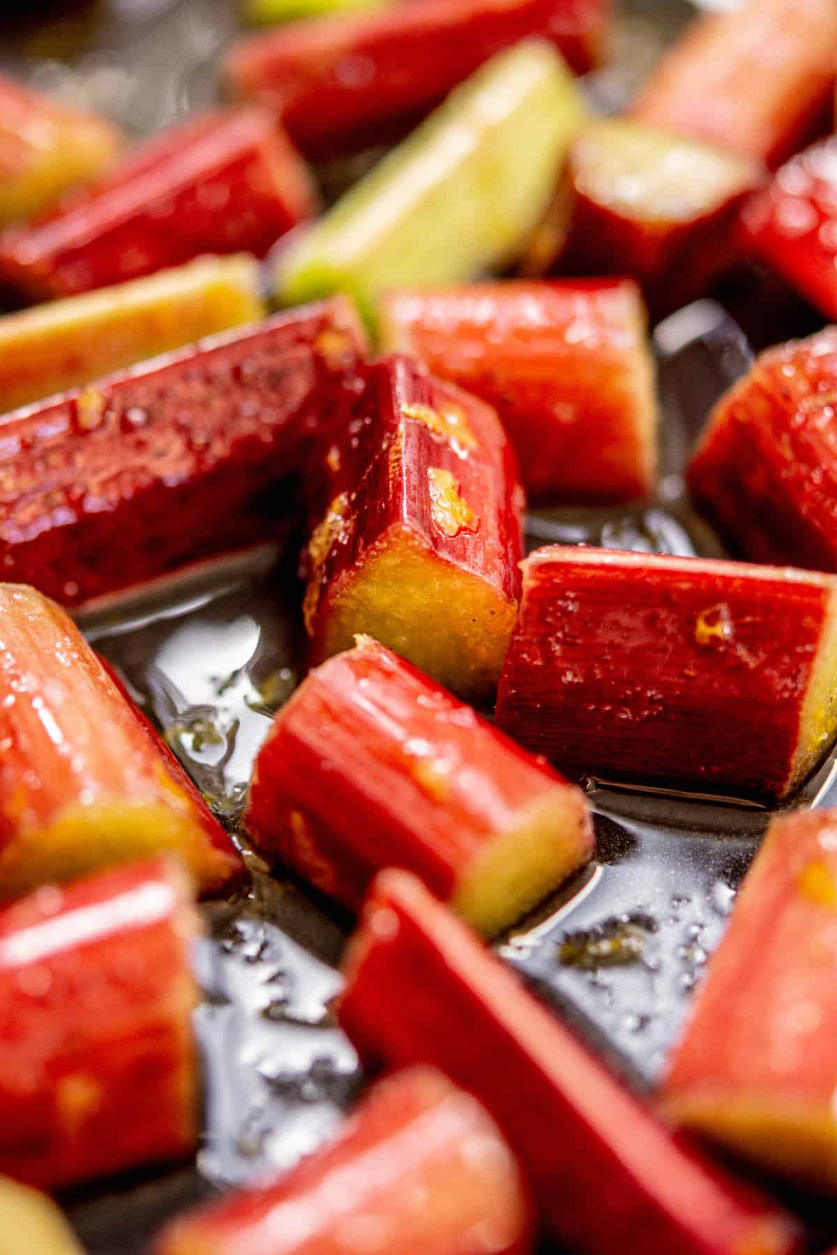 pieces of rhubarb on roasting tray.